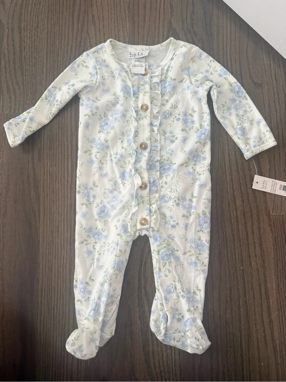 Nicole Miller Pale Blue Floral Ruffle-Front Footed One-Piece